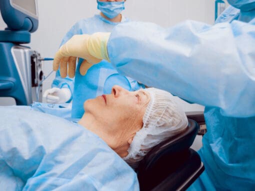 Ophthalmologist preparing patient for cataract surgery.