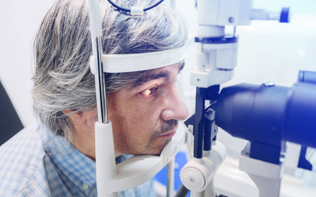 Man has comprehensive eye exam from ophthalmologist in Pittsburgh at Chang Eye Group.
