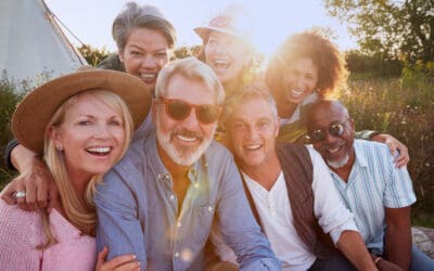 Happy group of people in 40s enjoying life outdoors.