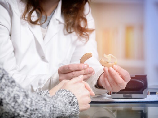 Audiologist in Pittsburgh explaining advanced technology used in hearing aids.
