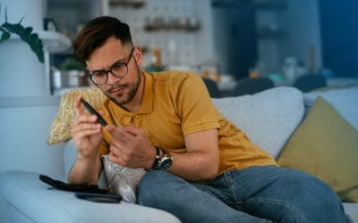 Man with diabetes in Pittsburgh testing blood sugar level and concerned about eye health.