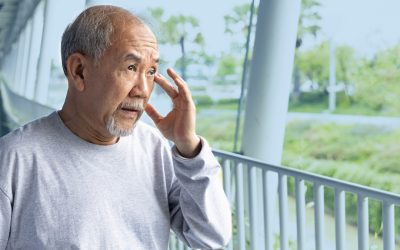 Elderly man experiencing central vision loss and sight difficulty.