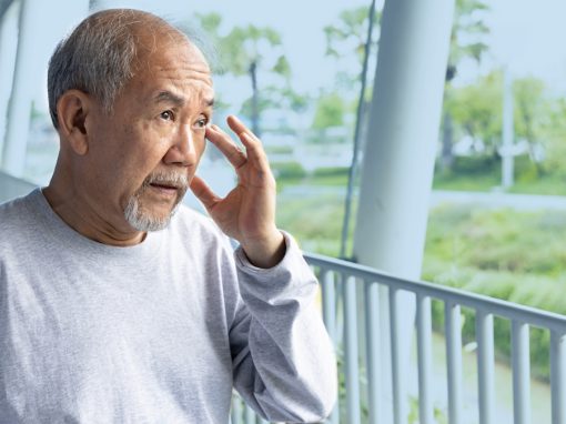 Elderly man experiencing central vision loss and sight difficulty.