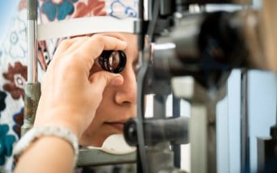 Woman having eye exam at Chang Eye Group following surgery in Pittsburgh.