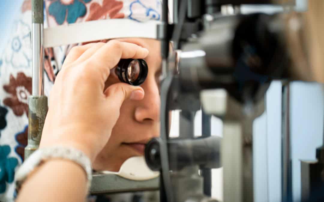pittsburgh-woman-eye-exam-post-surgery Woman having eye exam at Chang Eye Group following surgery in Pittsburgh.