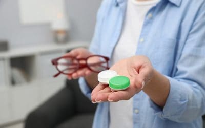 Woman in Pittsburgh deciding between glasses and contact lenses at Chang Eye Group.