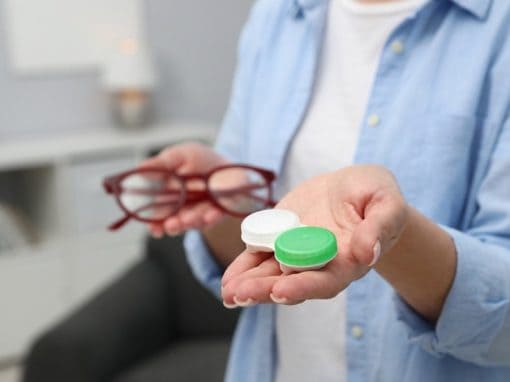 Woman in Pittsburgh deciding between glasses and contact lenses at Chang Eye Group.